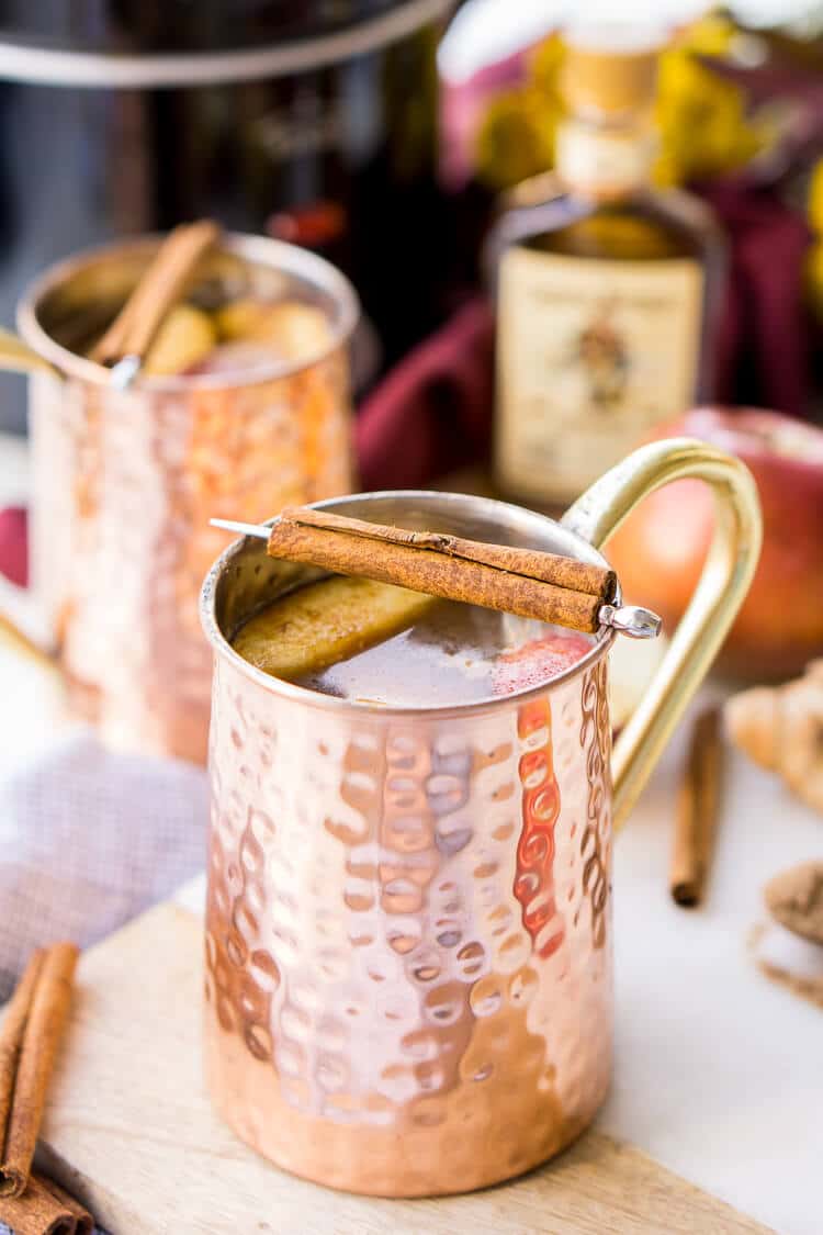 This Crock Pot Apple Cider will make entertaining a breeze this holiday season! Seasoned with cinnamon, apples, and ginger, this cider can simmer in the crock all night long! Keep the spiced rum on the side so guests have a boozy and non-alcoholic option!