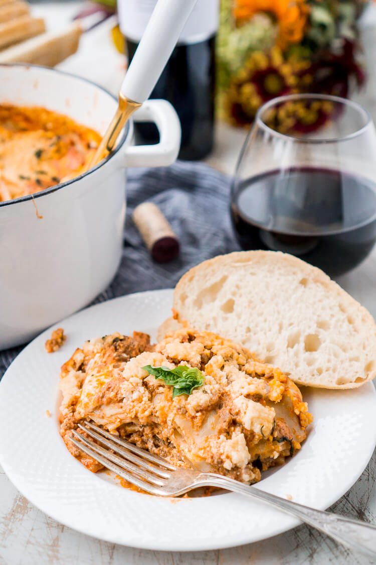 This Easy One Pot Lasagna is a cozy and comforting dish you can make in your Dutch oven in under an hour. A delicious meat sauce, oven-ready pasta, and three different kinds of cheese with a hint of basil and red pepper flakes make this a dish you'll want to make again and again!