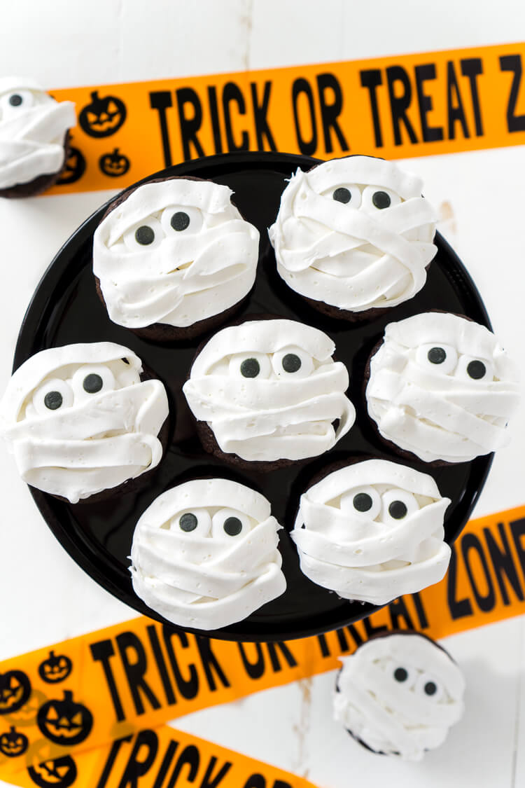 These spooky, sweet Mummy Halloween Cupcakes are the perfect addition to any Halloween celebration, whether it be a killer costume party or a scary movie marathon at home.