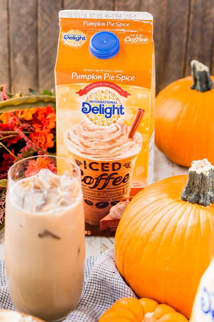 This Pumpkin Chocolate Chip Poke Cake is a deliciously seasonal dessert that's great for potlucks and family gatherings. A dense pumpkin spice cake soaked in sweetened condensed milk and loaded with chocolate chips is topped with a fluffy cheesecake frosting and dusted with cinnamon!