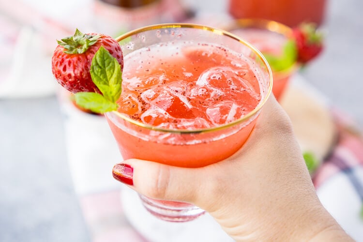 https://www.sugarandsoul.co/wp-content/uploads/2016/10/strawberry-champagne-punch-nye-party-recipe-1.jpg
