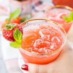 This Strawberry Champagne Punch is the ultimate pink drink! It's sparkly, easy to make, and loaded with strawberry sweetness! It's perfect for bridal showers, baby showers, and New Year's Eve Parties!