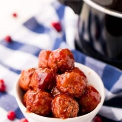These Cranberry Orange Meatballs are made with just 4 ingredients with just 5 minutes of prep work! Let your crockpot take care of the rest and serve up this delicious appetizer at your holiday and game day parties!