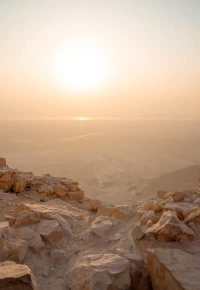 Planning a trip to Israel? Make sure a sunrise hike of Masada is on your itinerary, just an hour outside of Jerusalem, welcome the day from atop this ancient city and spend some time exploring the ruins. Here are a few tips to make the most of your trip!