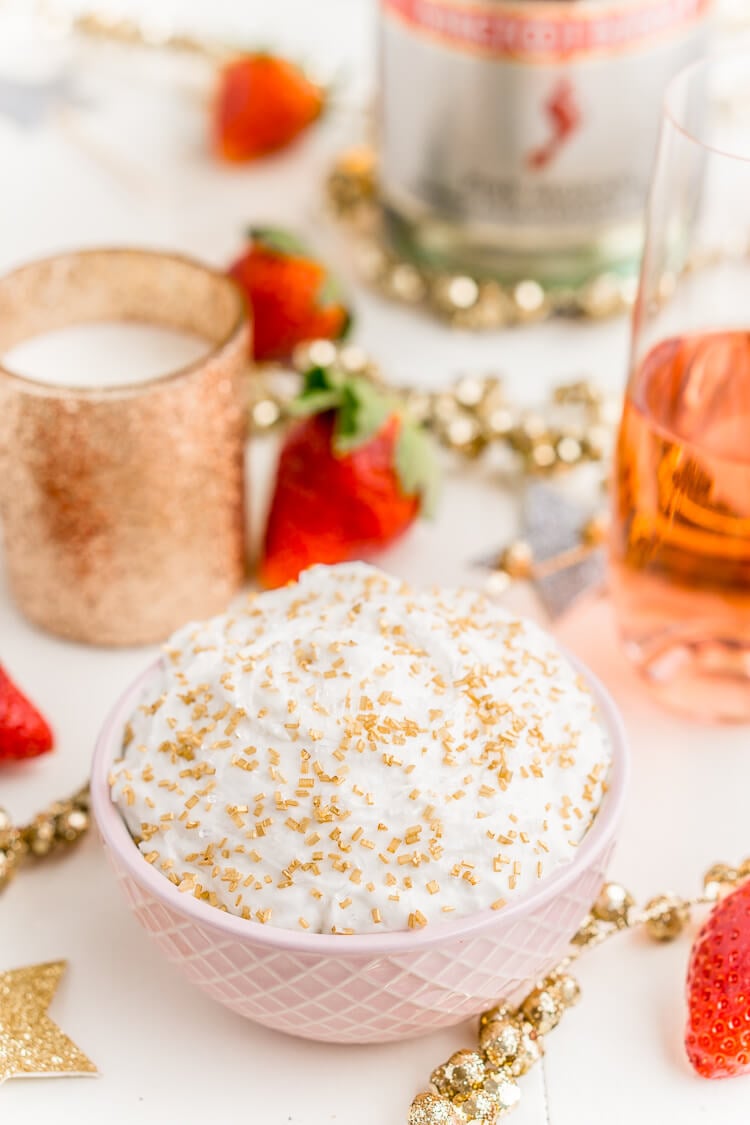 3-Ingredient Champagne Cake Dip is an easy no-bake dessert to whip together for New Year's Eve, Valentine's Day, or bridal showers. Perfect for dipping strawberries, graham crackers, and pretzels!