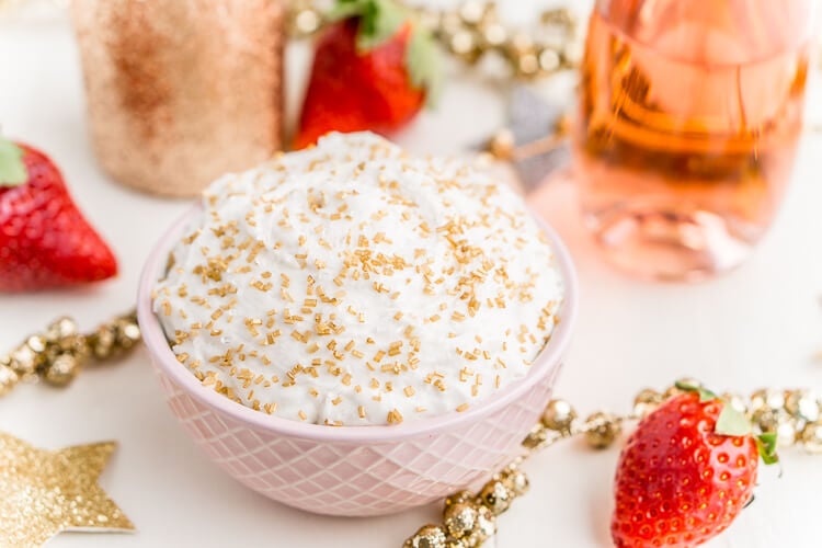 3-Ingredient Champagne Cake Dip is an easy no-bake dessert to whip together for New Year's Eve, Valentine's Day, or bridal showers. Perfect for dipping strawberries, graham crackers, and pretzels!