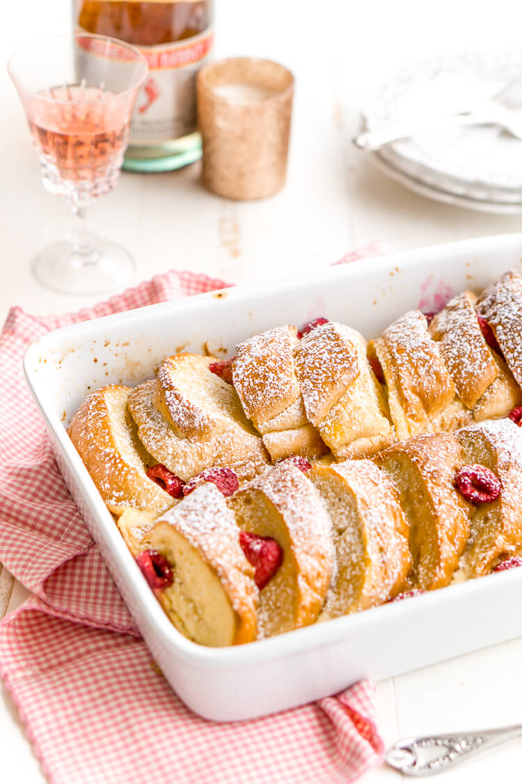 Champagne Raspberry Baked French Toast is the perfect way to kick off the New Year, Valentine's Day, or an anniversary! Prep it the night before so all you have to do is bake it in the morning!