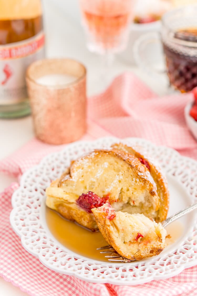 Champagne Raspberry Baked French Toast is the perfect way to kick off the New Year, Valentine's Day, or an anniversary! Prep it the night before so all you have to do is bake it in the morning!