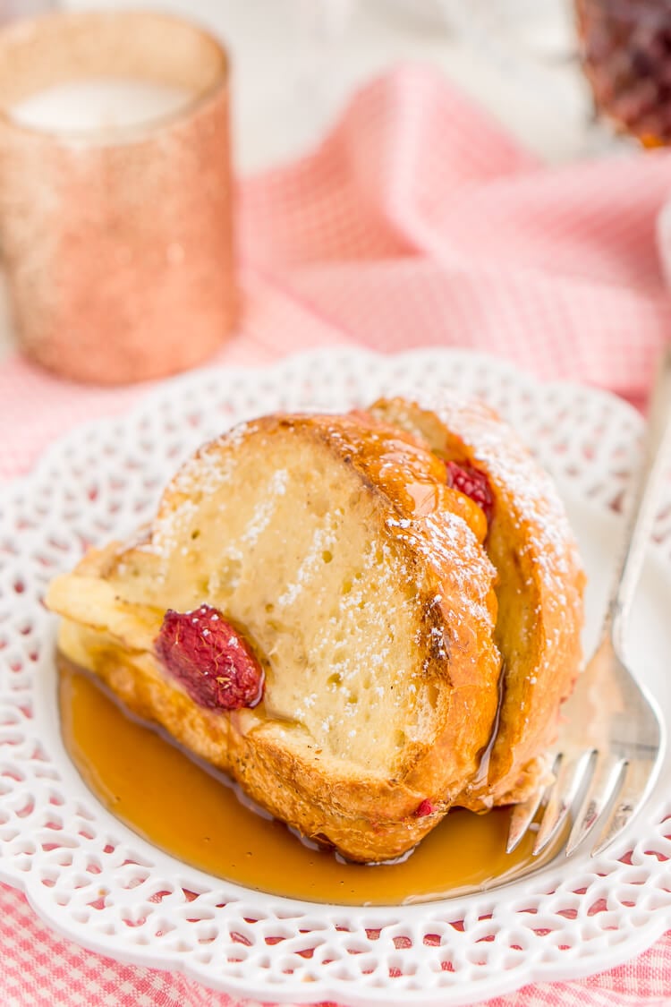 Champagne Raspberry Baked French Toast is the perfect way to kick off the New Year, Valentine's Day, or an anniversary! Prep it the night before so all you have to do is bake it in the morning!