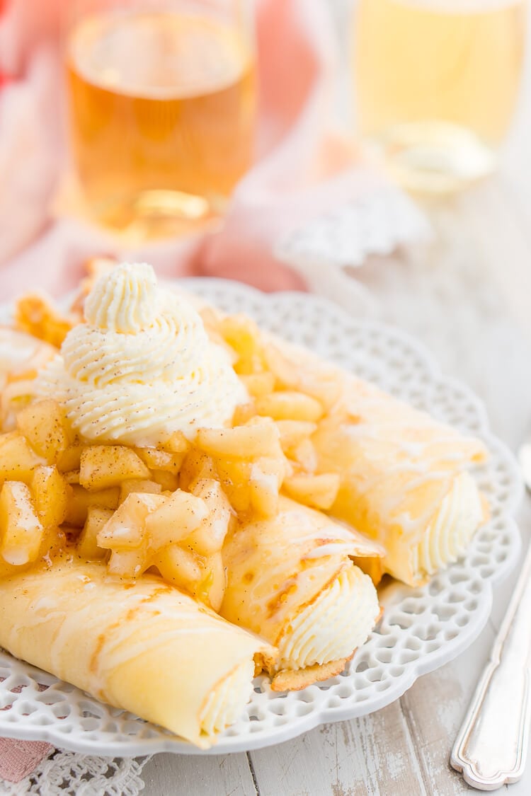 Apple Cheesecake Crepes are a fun way to sweeten up brunch or to be enjoyed as a decadent dessert!