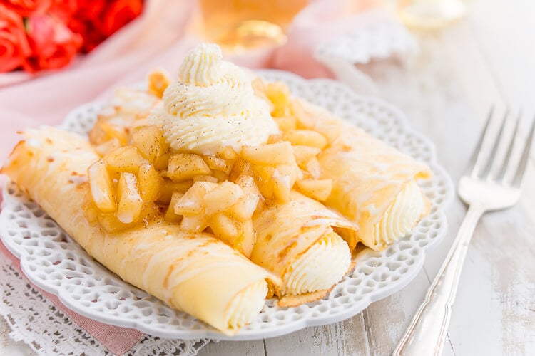 Apple Cheesecake Crepes are a fun way to sweeten up brunch or to be enjoyed as a decadent dessert!