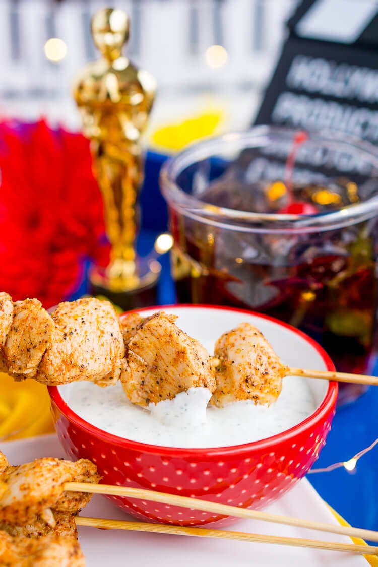 These Baked Cajun Chicken Skewers are marinated in zesty Cajun flavors, baked to perfection, and served with a creamy and cool mint yogurt sauce.