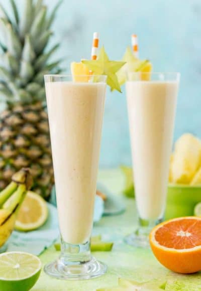 Tropical Smoothie is a delicious way to get in some vitamin C, protein, and potassium for breakfast or as an afternoon snack! It's loaded with orange juice, lime juice, lemon juice, banana, pineapple, and coconut extract for an extra fruity tropical flavor!