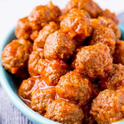 Pineapple Tequila Meatballs will get your game day party started out right! Just dump the four ingredients in the crock pot and let them slow cook for about 2 hours and they're ready to go!