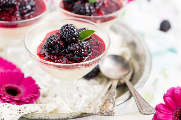 Blackberry Buttermilk Panna Cotta is a delicious Southern twist on a classic Italian dessert. A sweet panna cotta topped with a bold blackberry sauce.