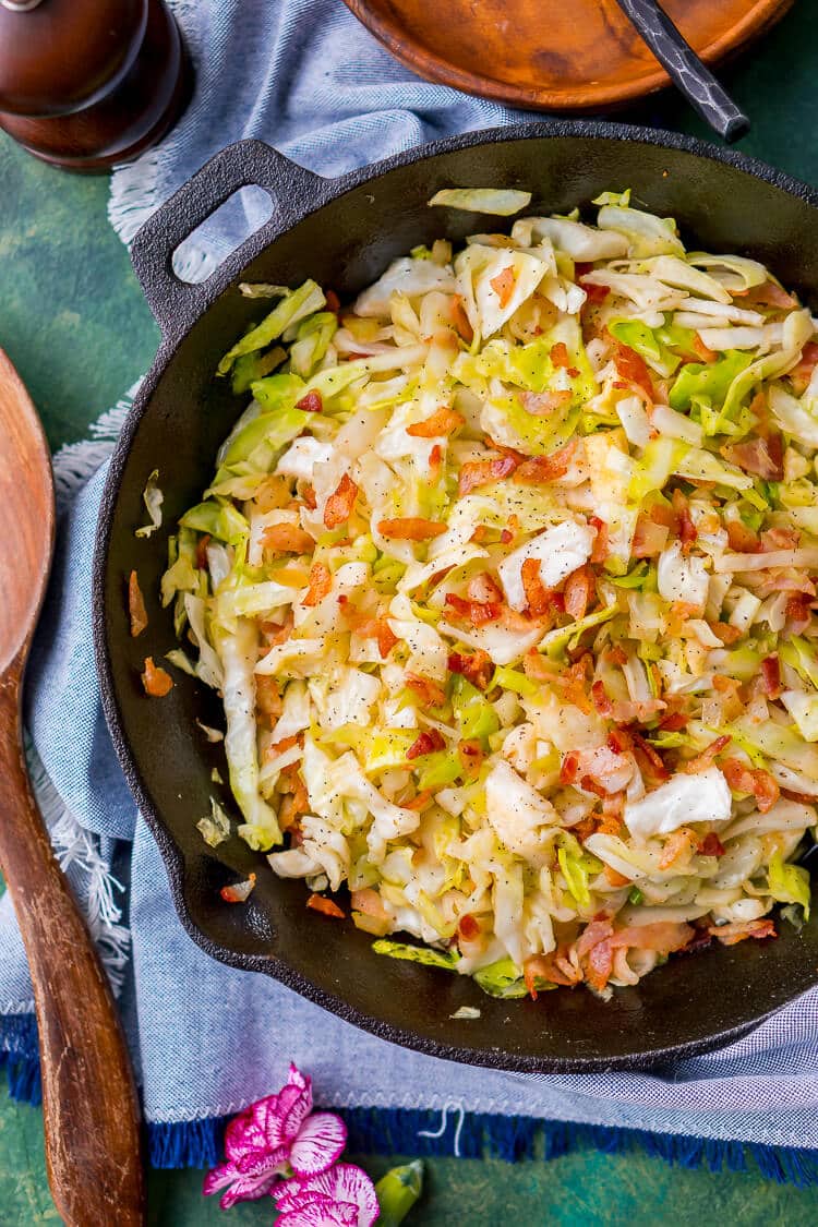 Irish Fried Cabbage and Bacon is a simple recipe that's pan fried in bacon grease and loaded up with bacon pieces and onion and seasoned with brown sugar, salt, and pepper.