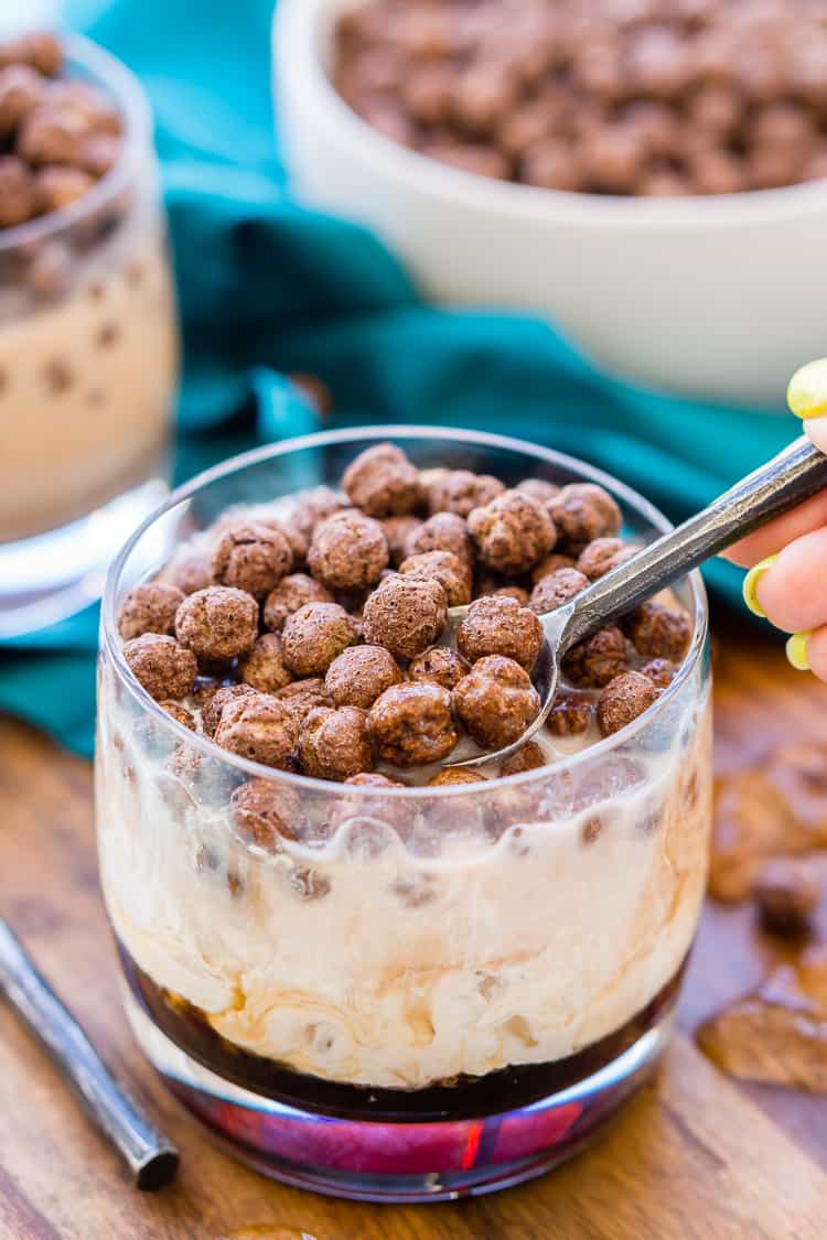 This Cocoa Puffs White Russian is a fun and unique twist on the classic cocktail made with Kahlua, vodka, cream and cocoa puffs. Perfect for late nights and brunch!