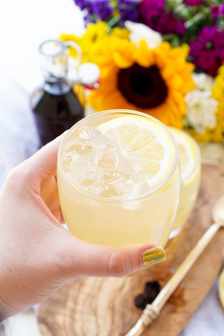 This Maple Lemonade is inspired by Maine and made with just lemon juice, maple syrup, and water. It's a refreshing cold drink for summer or fall!