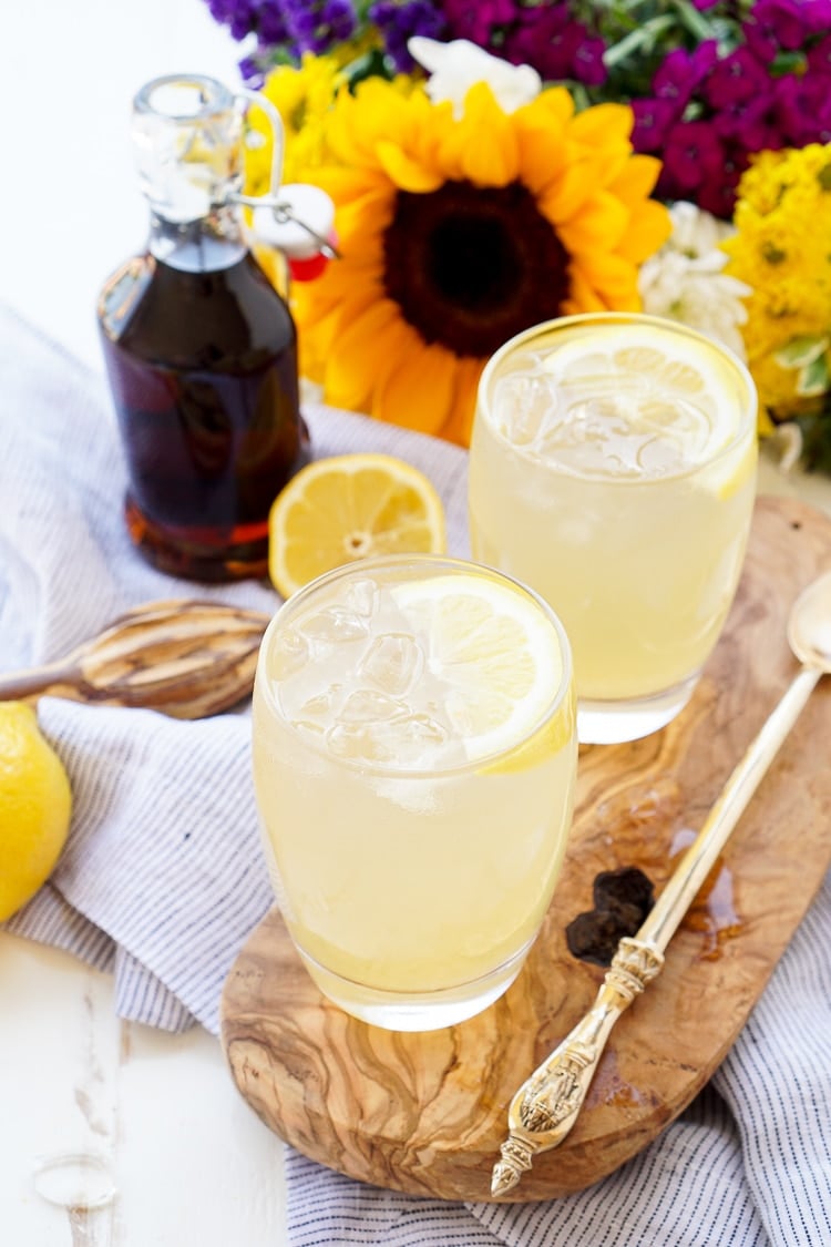 This Maple Lemonade is inspired by Maine and made with just lemon juice, maple syrup, and water. It's a refreshing cold drink for summer or fall!