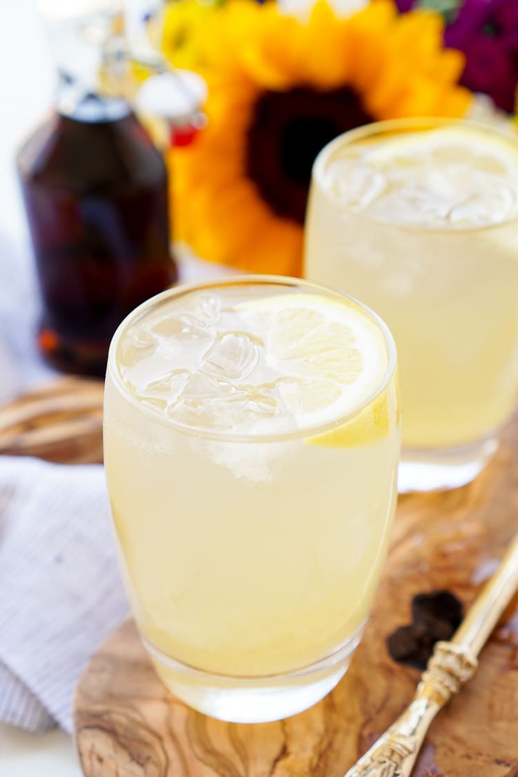 This Maple Lemonade is inspired by Maine and made with just lemon juice, maple syrup, and water. It's a refreshing cold drink for summer or fall!