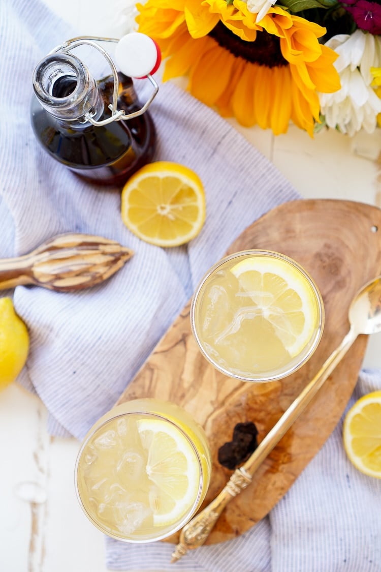 This Maple Lemonade is inspired by Maine and made with just lemon juice, maple syrup, and water. It's a refreshing cold drink for summer or fall!