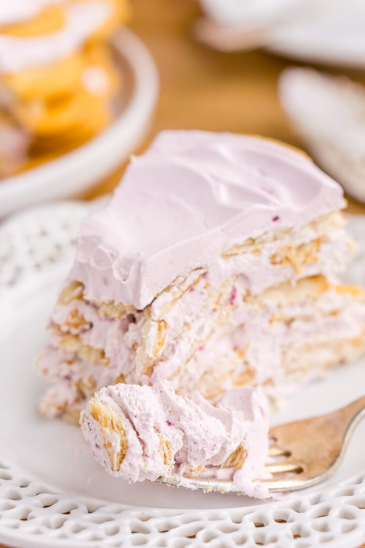This Ritz Cracker & Grape Jelly Icebox Cake is an old fashioned, no bake, 3-ingredient dessert the whole family will love! It's super EASY to make and you can whip it up the day before!