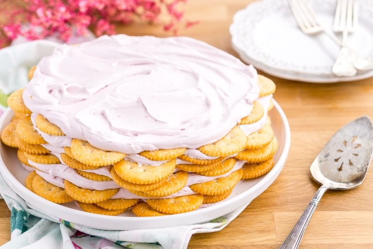 This Ritz Cracker & Grape Jelly Icebox Cake is an old fashioned, no bake, 3-ingredient dessert the whole family will love! It's super EASY to make and you can whip it up the day before!