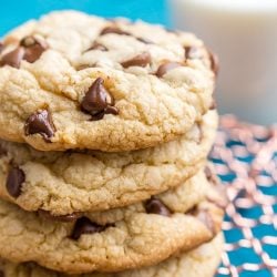 Close up photo of a stack of chocolate chip cookies.