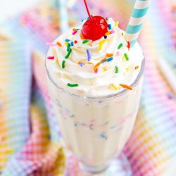 This Birthday Cake Milkshake is ready in 5 minutes and made with just 5 simple ingredients - ice cream, milk, vanilla, sugar, and sprinkles - and is perfect for when you want a quick sweet treat.