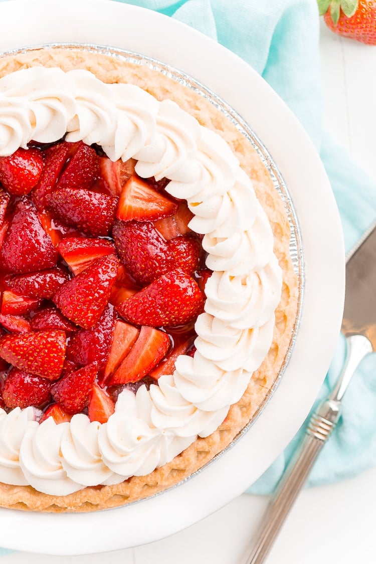 This Fresh Strawberry Margarita Pie is made with fresh, ripe strawberries, smooth Altos Tequila, and a few other simple ingredients for a boozy summertime dessert!