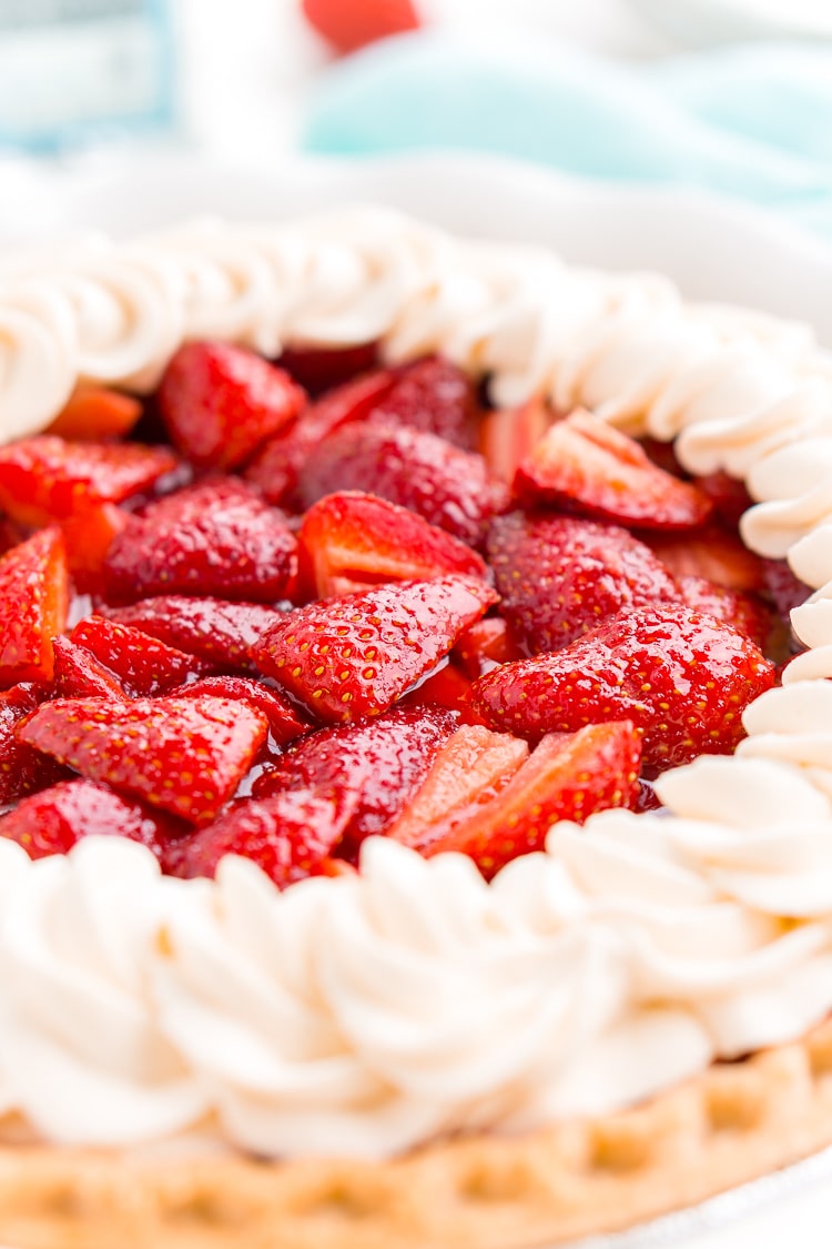 This Fresh Strawberry Margarita Pie is made with fresh, ripe strawberries, smooth Altos Tequila, and a few other simple ingredients for a boozy summertime dessert!