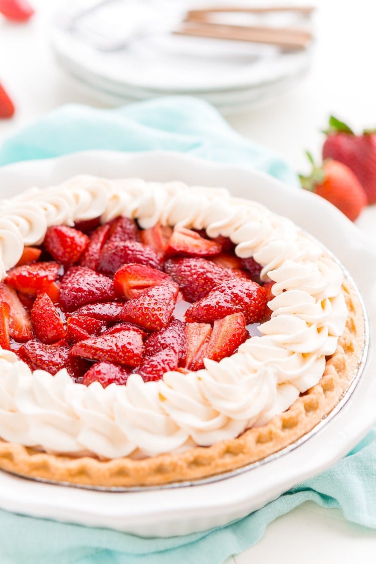 This Fresh Strawberry Margarita Pie is made with fresh, ripe strawberries, smooth Altos Tequila, and a few other simple ingredients for a boozy summertime dessert!