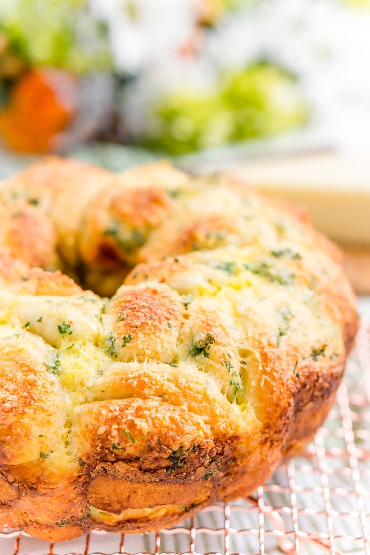 This Garlic Parmesan Monkey Bread is so easy to make and packs tons of flavor! Perfect as a savory side for brunch and dinner!