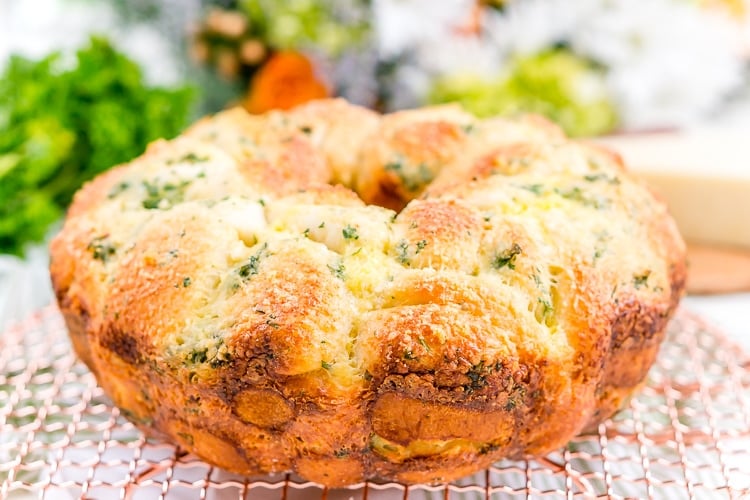 This Garlic Parmesan Monkey Bread is so easy to make and packs tons of flavor! Perfect as a savory side for brunch and dinner!