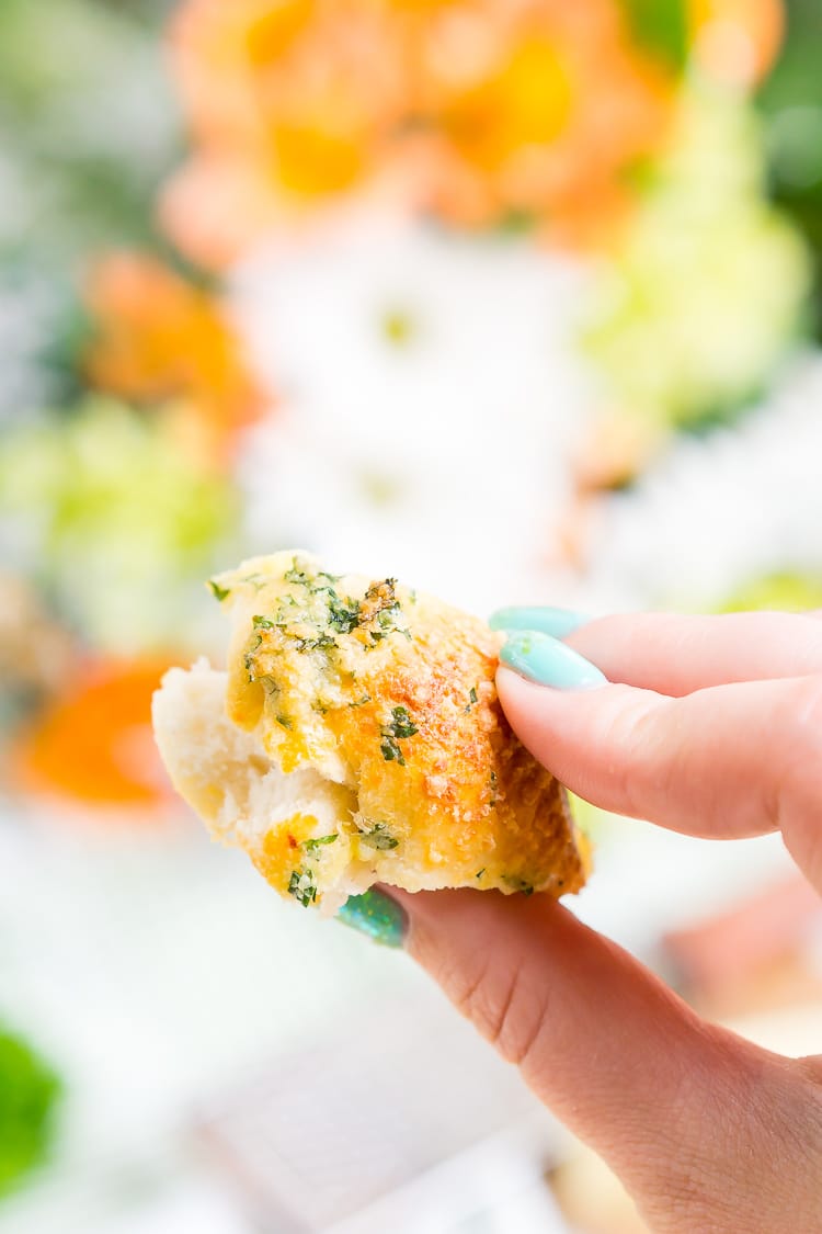 This Garlic Parmesan Monkey Bread is so easy to make and packs tons of flavor! Perfect as a savory side for brunch and dinner!