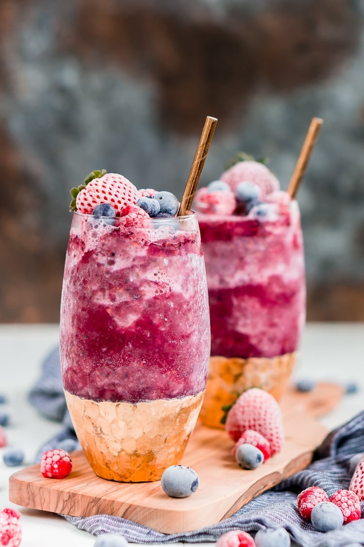 Sangria Slushies are loaded with berry and citrus flavors and Red Moscato making it the perfect frozen cocktail for summer!
