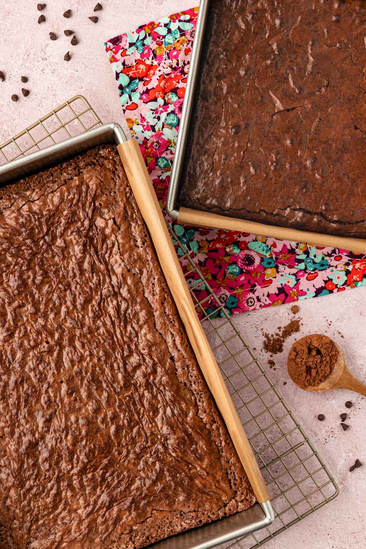 Overhead photo of two pans of brownies on a table.