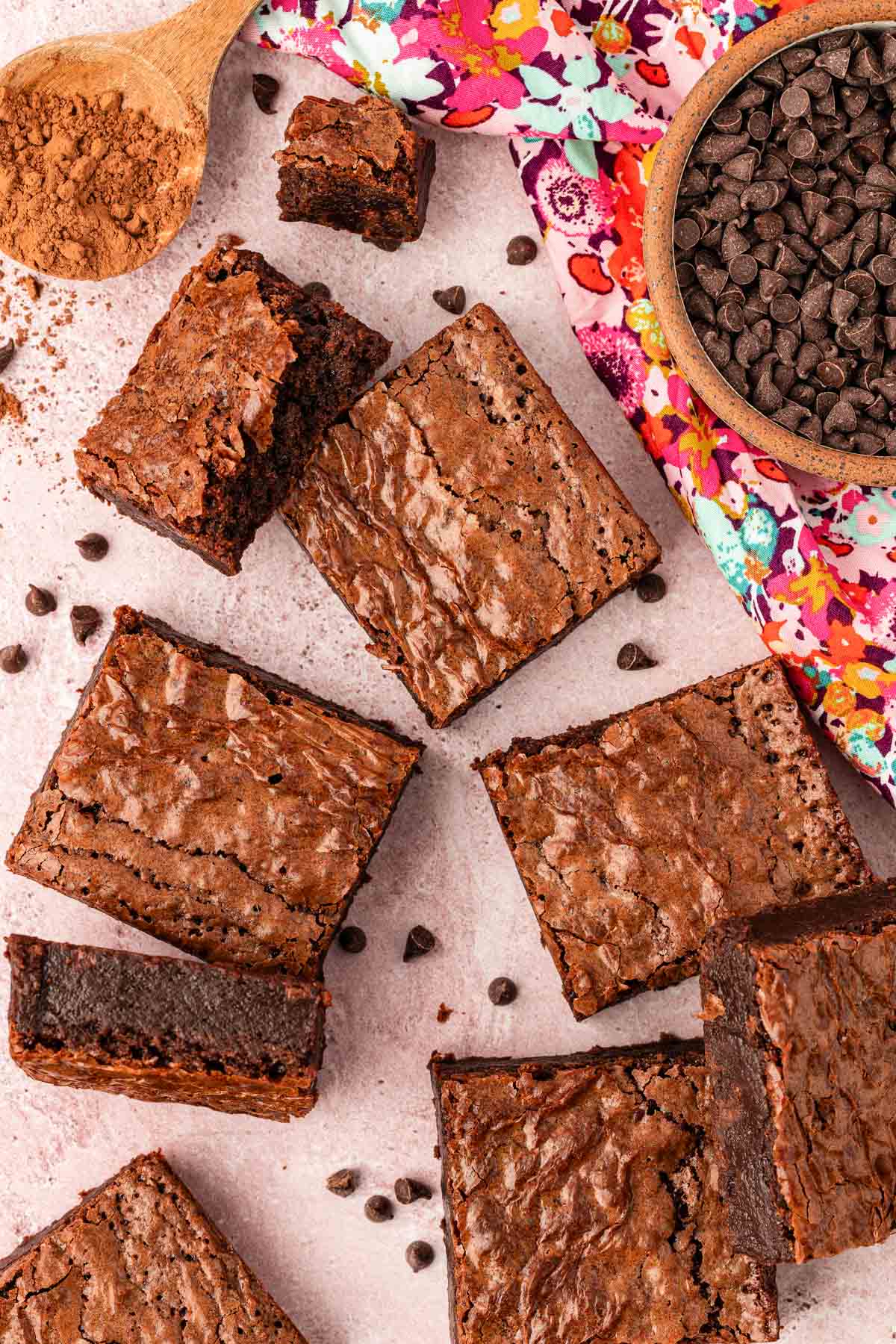 Brownie slices scattered on a table.