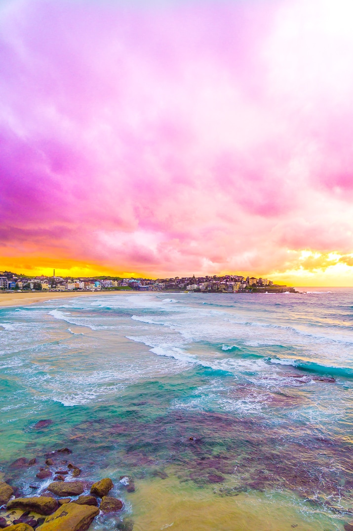 A Day At Bondi Beach is an absolute must when visiting Sydney, Australia. Go swimming, surfing, and eat your way along the boardwalk!