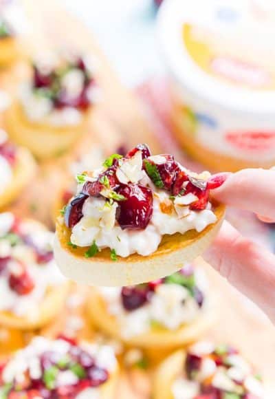 This Cottage Cheese & Cherry Crostini is a fresh and delicious appetizer recipe. Toasted bread topped with silky cottage cheese, cherries, almonds, honey, and mint!