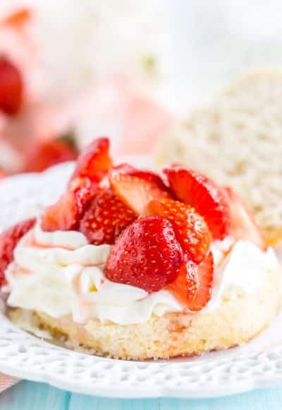 This Easy Strawberry Shortcake recipe is made with fresh strawberries, homemade whipped cream, and a delicious sugar biscuit for a classic summer dessert!