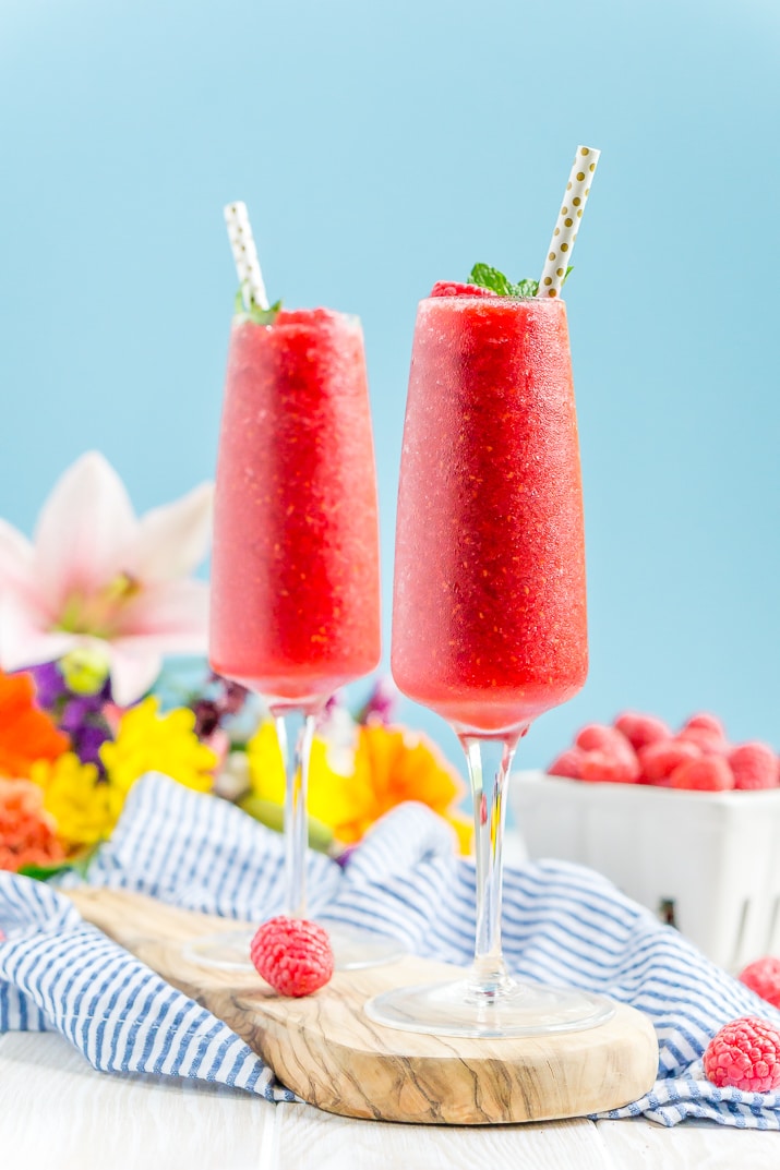 These Raspberry Champagne Slushies are made with just 4 ingredients in 5 minutes and are a fun way to celebrate summer, bridal showers, and even the New Year!