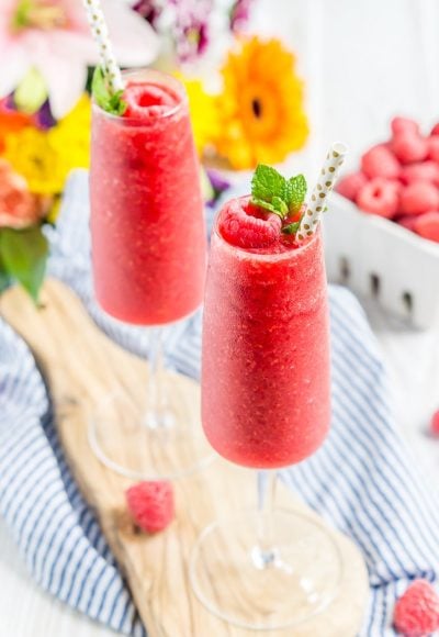 These Raspberry Champagne Slushies are made with just 4 ingredients in 5 minutes and are a fun way to celebrate summer, bridal showers, and even the New Year!