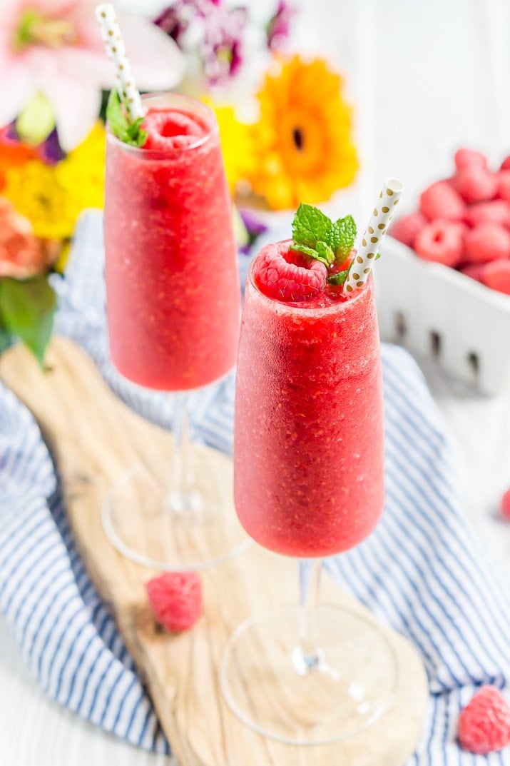 These Raspberry Champagne Slushies are made with just 4 ingredients in 5 minutes and are a fun way to celebrate summer, bridal showers, and even the New Year!