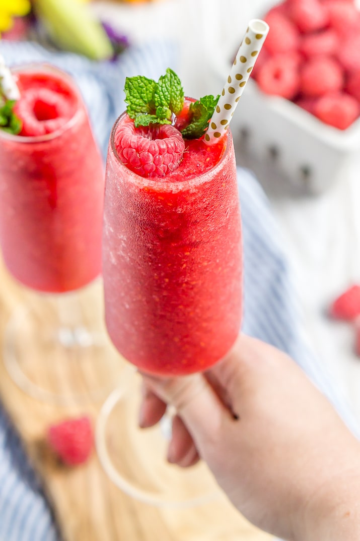 These Raspberry Champagne Slushies are made with just 4 ingredients in 5 minutes and are a fun way to celebrate summer, bridal showers, and even the New Year!