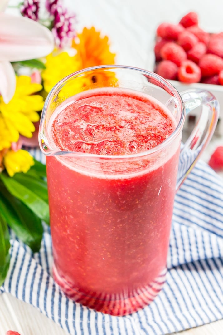 These Raspberry Champagne Slushies are made with just 4 ingredients in 5 minutes and are a fun way to celebrate summer, bridal showers, and even the New Year!