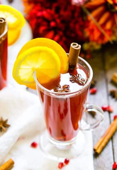 This Pomegranate Cider is an instant fall favorite! A cozy, hot drink that's loaded with spices, citrus, and delicious pomegranate. Add rum or whiskey to turn it into a cocktail!