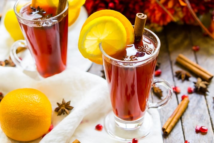 This Pomegranate Cider is an instant fall favorite! A cozy, hot drink that's loaded with spices, citrus, and delicious pomegranate. Add rum or whiskey to turn it into a cocktail!