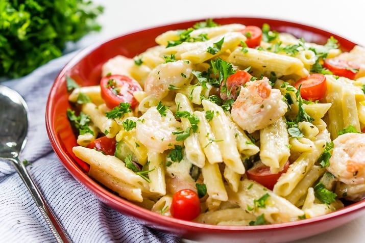 This Shrimp Alfredo is loaded with delicious shrimp, fresh veggies, and a creamy alfredo sauce that will have the whole family running to the table! Serve it up with the pasta of your choice!