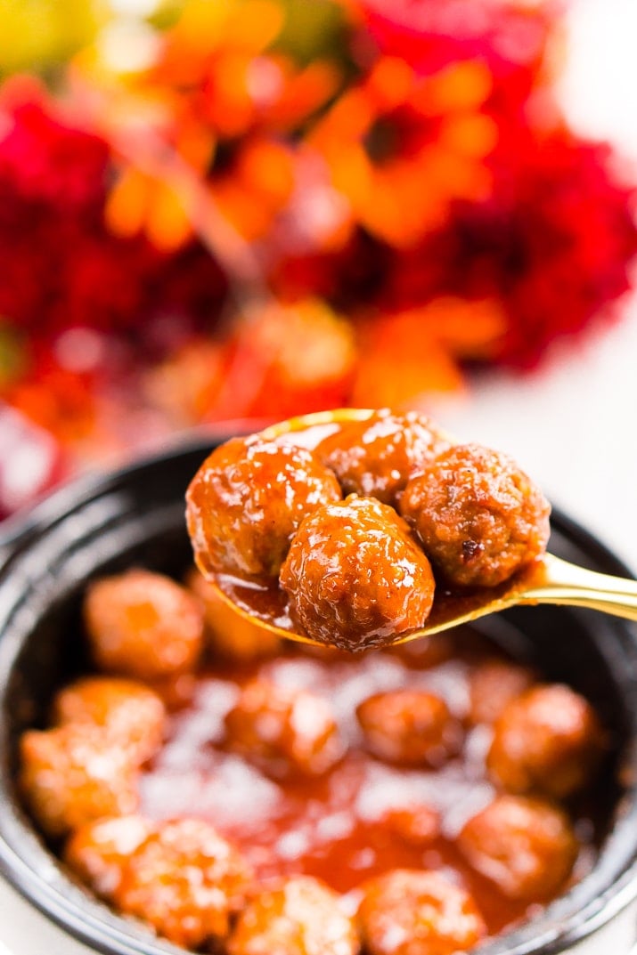These Apple Cocktail Meatballs are an easy party food appetizer that's made in the slow cooker and loaded with flavors that will tantalize your taste buds!